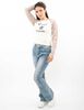 Polera Raglán Con Estampado Mujer Icono