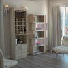 Mueble Bar + Biblioteca Cubo TuHome Beijing