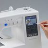 Máquina de coser y bordar Janome  MC1000 49 W