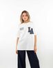 Polera Oversized Con Estampado Manga Corta Mujer Icono