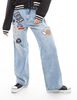 Jeans Con Parches Recto Mujer Icono